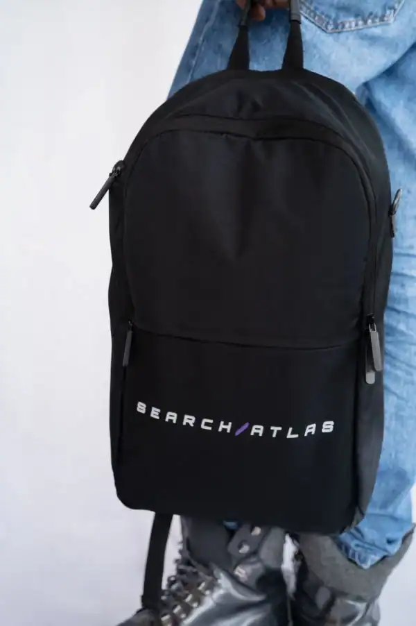 Black Search Atlas branded backpack for travel and everyday use with multiple compartments and durable material. Perfect for students, commuters, and outdoor enthusiasts.