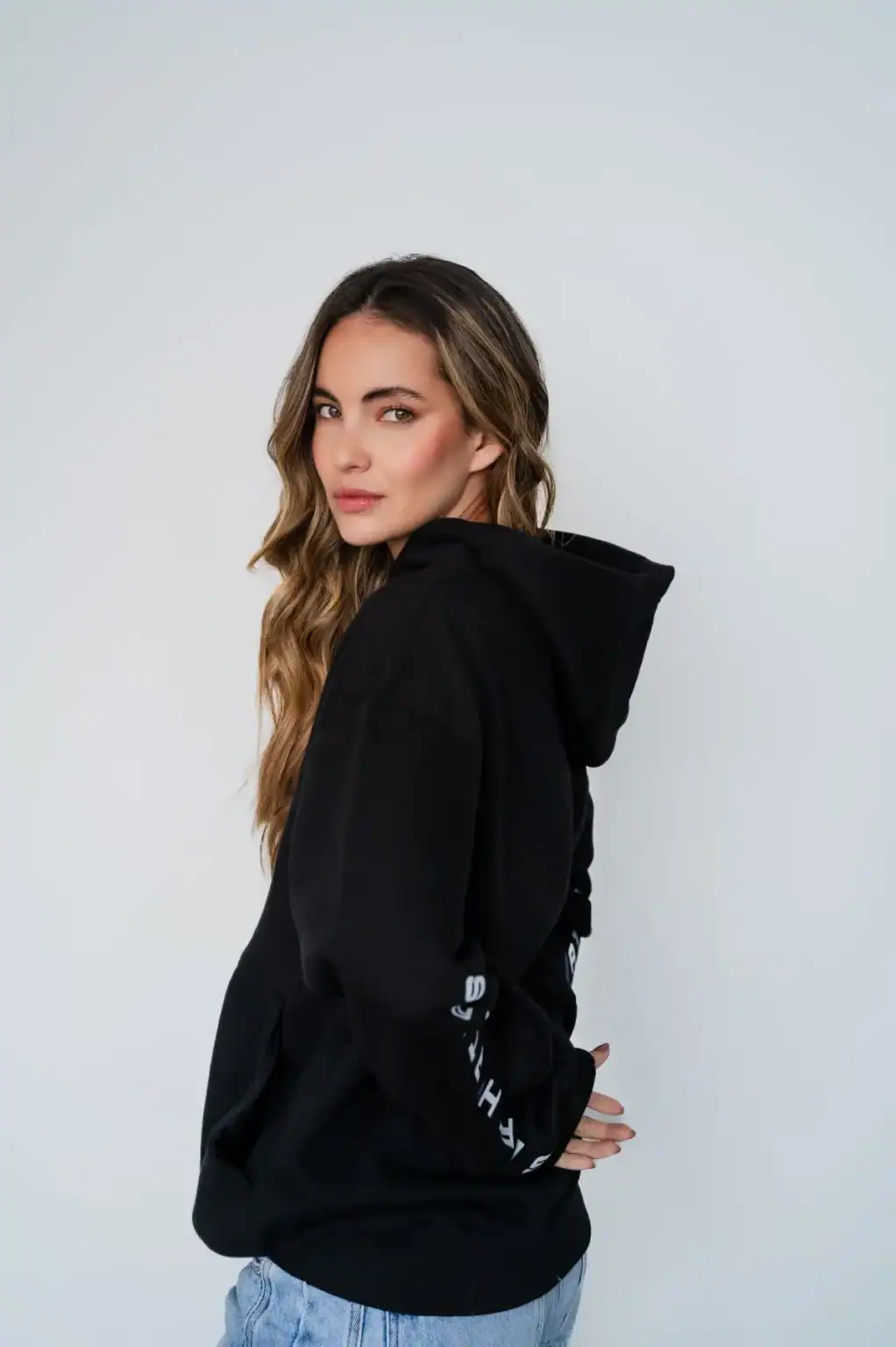 Stylish black hoodie with white text on sleeve, perfect for casual and athletic wear, featured in the Search Atlas Store online shopping platform.