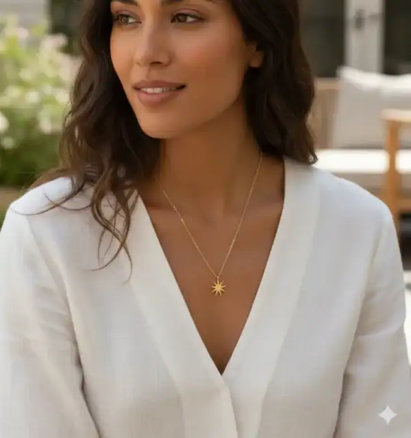 Gold starburst pendant necklace, stylish jewelry for women, elegant gold star necklace, Search Atlas Store fashion accessories, beautiful everyday gold jewelry.