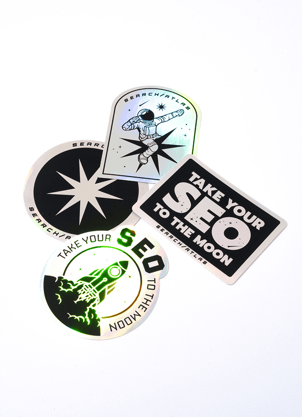 Colorful SearchAtlas stickers featuring space-themed designs and motivational slogans. Perfect for branding, marketing, or personalizing tech gadgets with SEO and digital marketing focus.