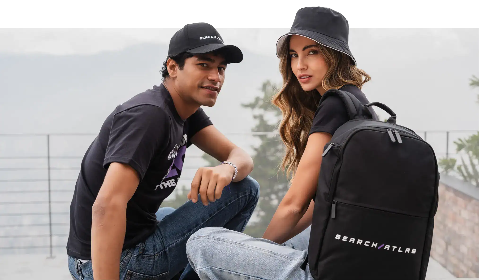 Stylish black Search Atlas backpack with logo, designed for travel and daily use, ideal for students, commuters, and outdoor enthusiasts, featuring multiple compartments for convenience.